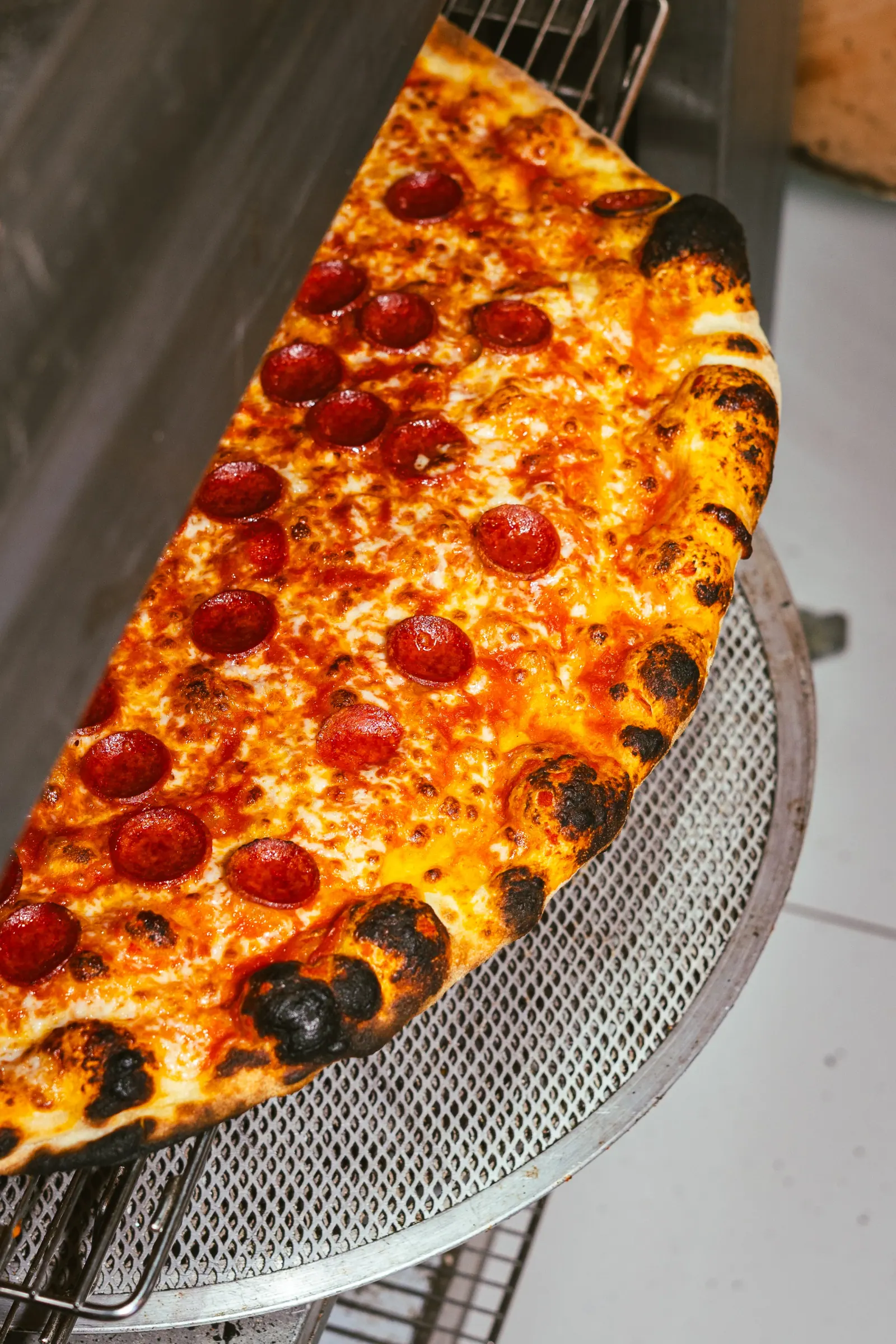 Cheese pull from a hot slice at Frankie's Cork